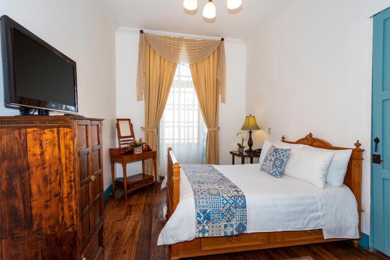 Del Parque Hotel & Suites Куэнка Экстерьер фото